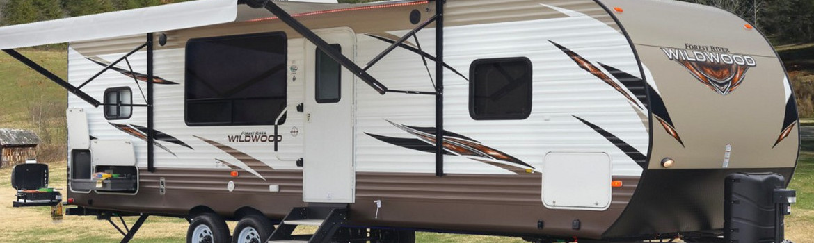 2021 Forrest River Wildwood parked with the awning open